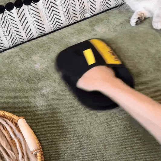 Glove removing pet hair in action